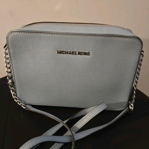 Michael Kors Handbags - The Michael Kors Jet Set Travel Crossbody Bag in light blue